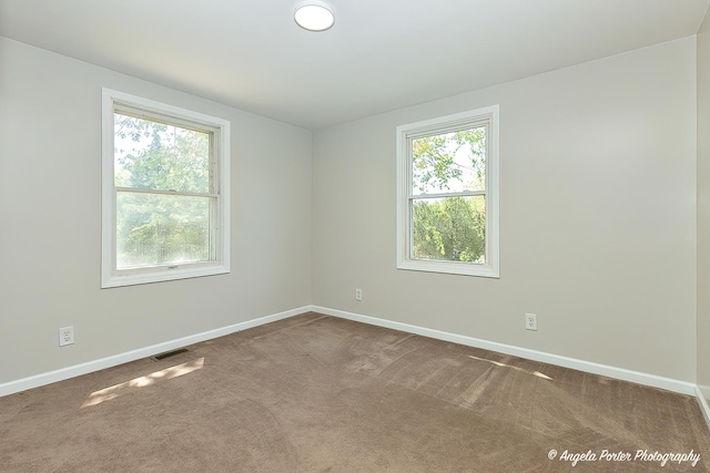 5305 N Highland Dr, Mchenry, IL 60050 - unfurnished room with baseboards and carpet