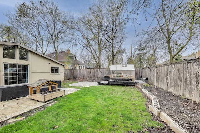 523 Green Bay Rd, Highland Park, IL 60035 - view of yard featuring a greenhouse, a garden, and an outbuilding
