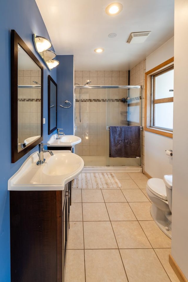4610 Main St, Lisle, IL 60532 - bathroom featuring a stall shower, tile patterned flooring, toilet, and vanity