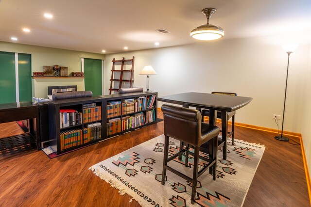 4610 Main St, Lisle, IL 60532 - dining area featuring a fireplace, wood finished floors, recessed lighting, and baseboards