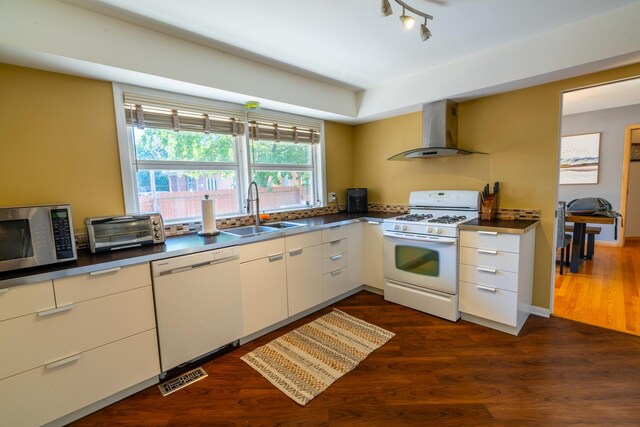 4610 Main St, Lisle, IL 60532 - kitchen with white appliances, a sink, wall chimney range hood, dark wood finished floors, and white cabinets
