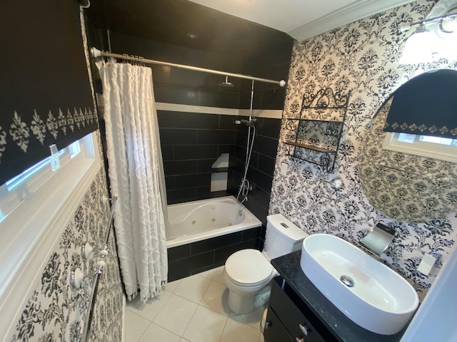 bathroom with a combined bath / shower with jetted tub, tile patterned floors, vanity, and toilet