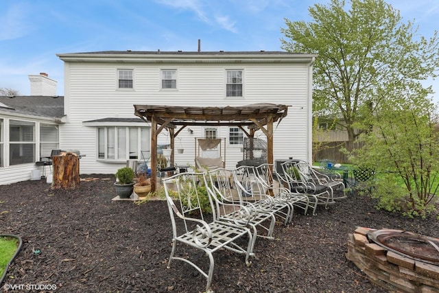 25 E Donovan Ct, Crete, IL 60417 - back of house with an outdoor fire pit, a pergola, and a patio area
