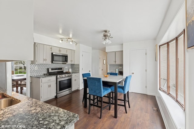 25 E Donovan Ct, Crete, IL 60417 - dining area featuring dark wood finished floors and ceiling fan