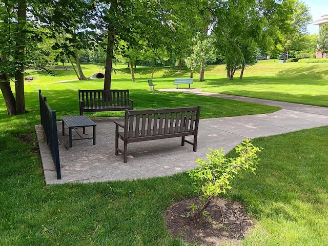 surrounding community featuring a yard