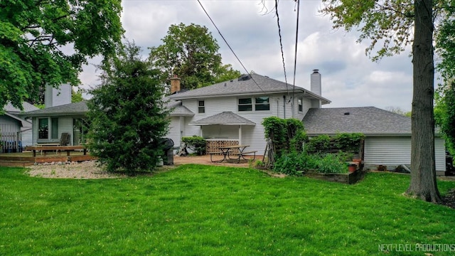 2663 Southcrest Dr, Downers Grove, IL 60516 - rear view of property featuring a lawn, a chimney, and a patio