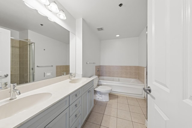 1250 S Michigan Ave Unit 1502, Chicago, IL 60605 - full bath featuring tile patterned flooring, double vanity, a garden tub, a stall shower, and toilet