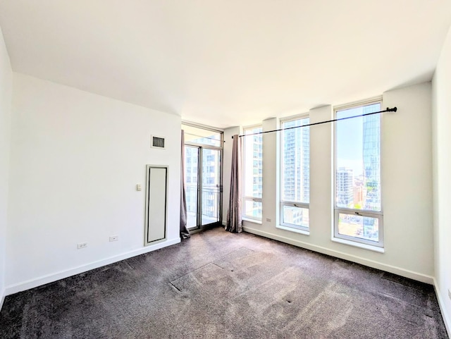 1250 S Michigan Ave Unit 1502, Chicago, IL 60605 - carpeted empty room featuring baseboards