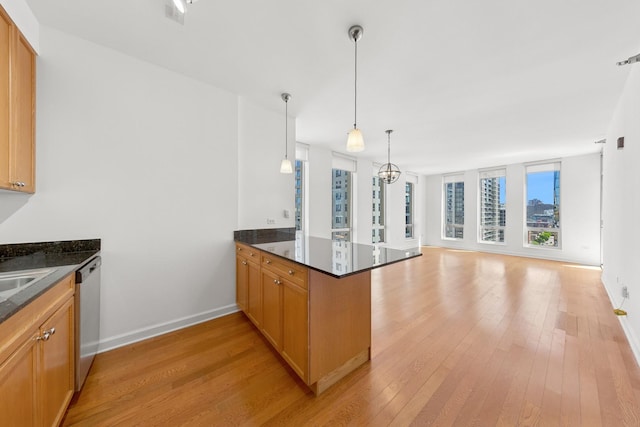 1250 S Michigan Ave Unit 1502, Chicago, IL 60605 - kitchen with dishwasher, a peninsula, light wood finished floors, and baseboards