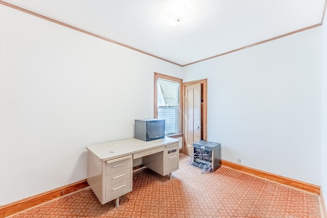 unfurnished office with baseboards and crown molding