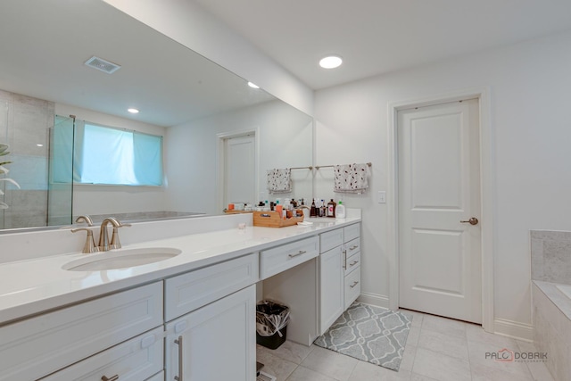 1027 Button Bush St, South Elgin, IL 60177 - full bath featuring a shower stall, a bath, vanity, tile patterned flooring, and recessed lighting