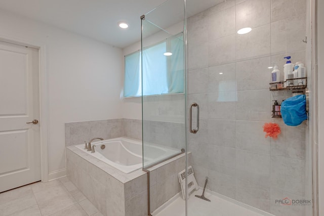 1027 Button Bush St, South Elgin, IL 60177 - full bathroom with a stall shower, a garden tub, and tile patterned floors