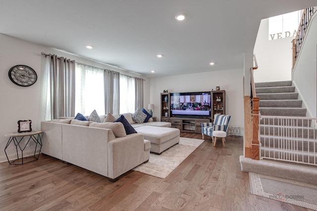 1027 Button Bush St, South Elgin, IL 60177 - living area featuring stairs, light wood-style floors, and recessed lighting