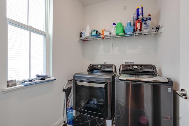 1027 Button Bush St, South Elgin, IL 60177 - laundry area with washer and clothes dryer and baseboards