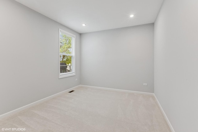 2508 Weatherbee Ln, Naperville, IL 60563 - spare room featuring light colored carpet, baseboards, and recessed lighting
