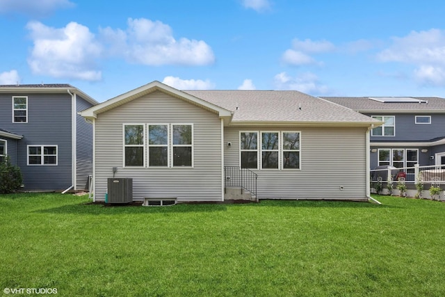 2508 Weatherbee Ln, Naperville, IL 60563 - rear view of house featuring a lawn and central air condition unit