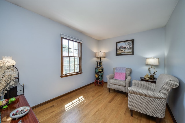 1628 Westminster Dr, Naperville, IL 60563 - sitting room with light wood finished floors and baseboards