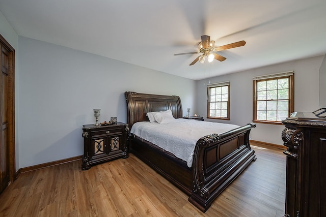 1628 Westminster Dr, Naperville, IL 60563 - bedroom featuring baseboards, light wood-style flooring, and ceiling fan