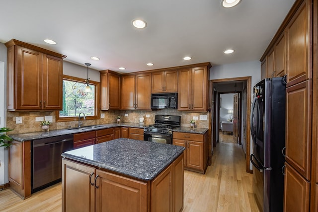 1628 Westminster Dr, Naperville, IL 60563 - kitchen featuring black appliances, a sink, light wood-type flooring, brown cabinets, and recessed lighting