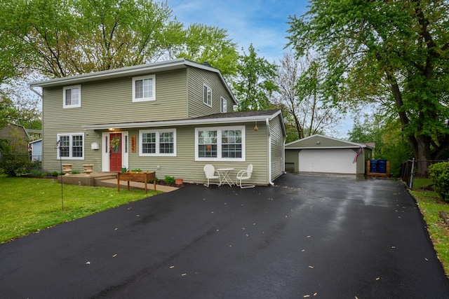 18450 W Streamwood Ct, Gurnee, IL 60031 - traditional-style house with a detached garage, an outbuilding, and a front lawn