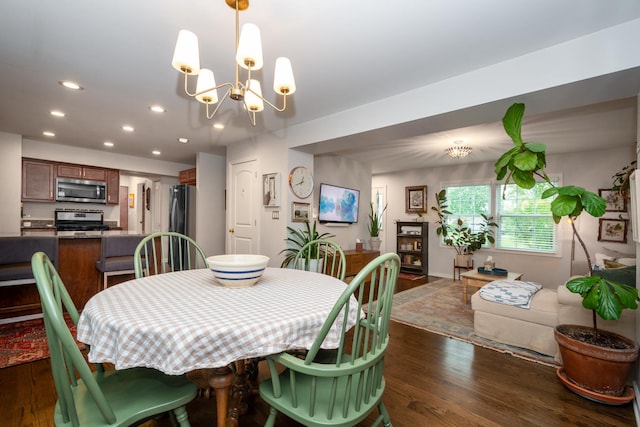 18450 W Streamwood Ct, Gurnee, IL 60031 - dining area with dark wood-style floors, recessed lighting, and a chandelier
