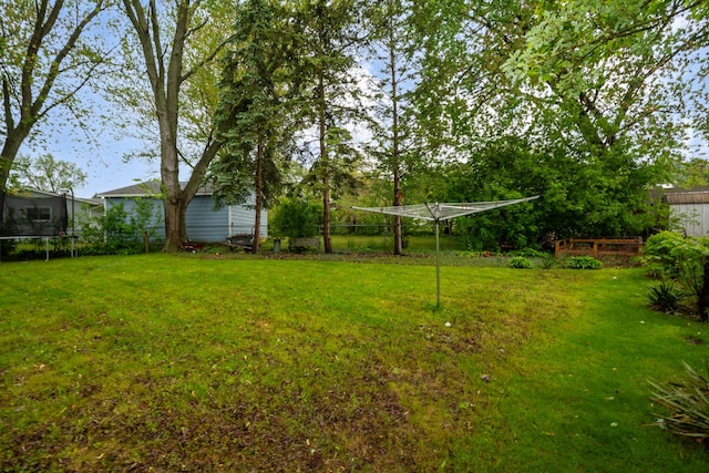 18450 W Streamwood Ct, Gurnee, IL 60031 - view of green lawn with a trampoline