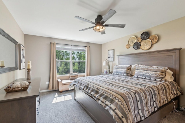 carpeted bedroom with a ceiling fan