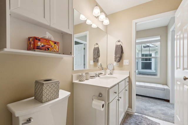 half bath with vanity and toilet