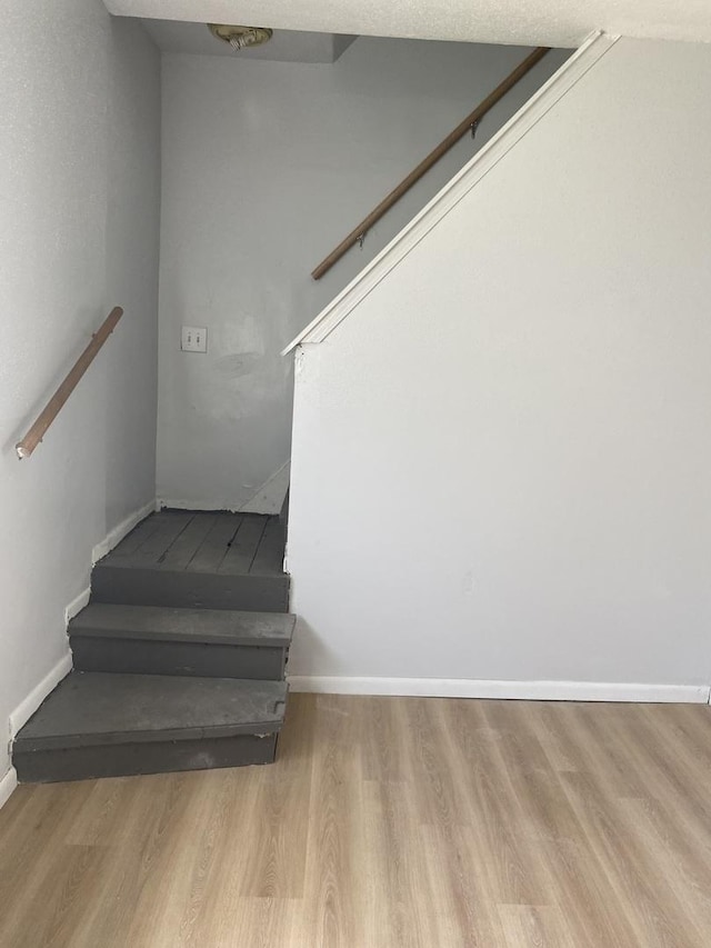 11809 S Lafayette Ave, Chicago, IL 60628 - stairway with wood finished floors and baseboards