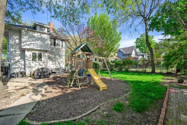 view of yard with a playground