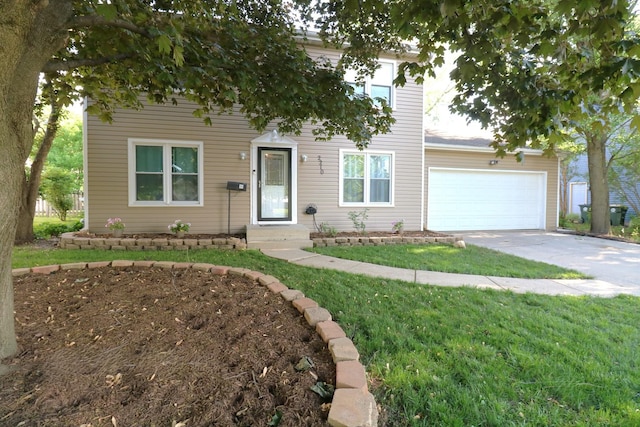 2210 Sandburg Dr, Aurora, IL 60506 - view of front of house with concrete driveway, a garage, and a front yard
