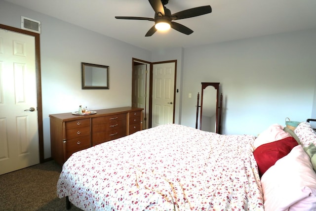 2210 Sandburg Dr, Aurora, IL 60506 - bedroom with dark carpet and ceiling fan