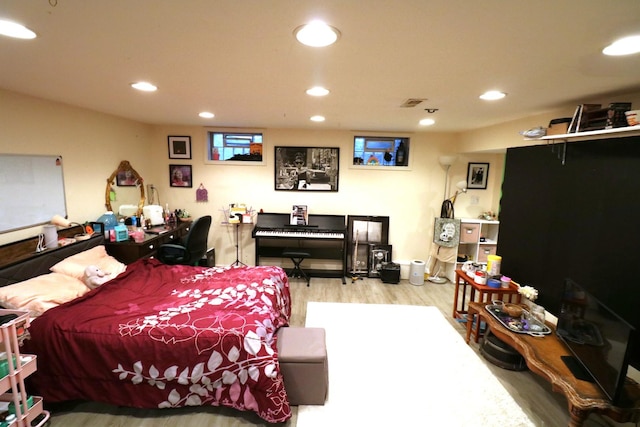2210 Sandburg Dr, Aurora, IL 60506 - bedroom featuring wood finished floors and recessed lighting