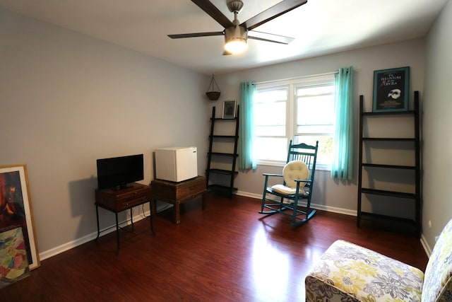 2210 Sandburg Dr, Aurora, IL 60506 - living area featuring a ceiling fan, wood finished floors, and baseboards