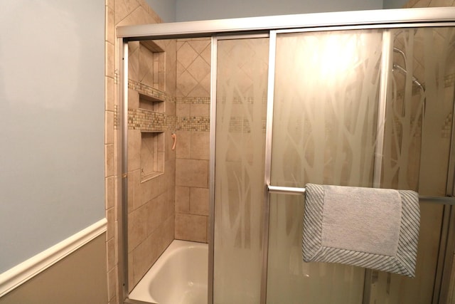 2210 Sandburg Dr, Aurora, IL 60506 - bathroom with bath / shower combo with glass door