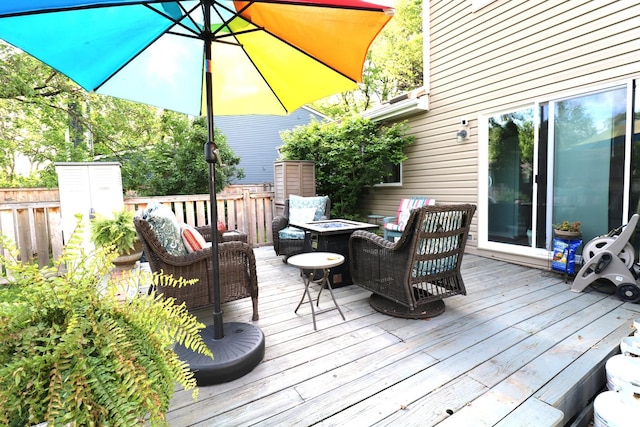 2210 Sandburg Dr, Aurora, IL 60506 - deck featuring an outdoor living space with a fire pit