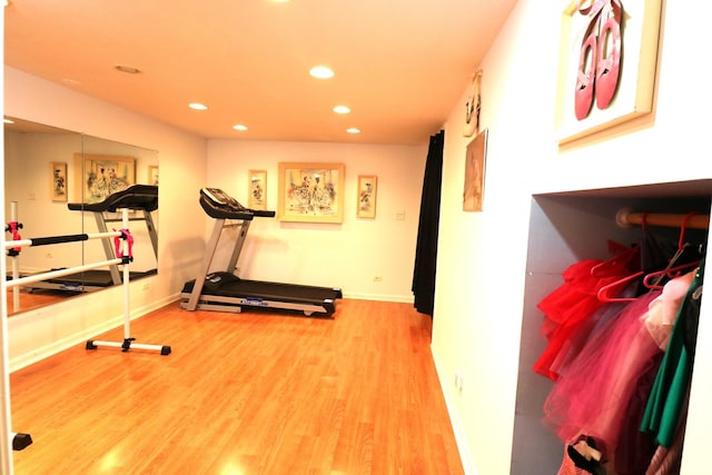 2210 Sandburg Dr, Aurora, IL 60506 - exercise room featuring recessed lighting, wood finished floors, and baseboards