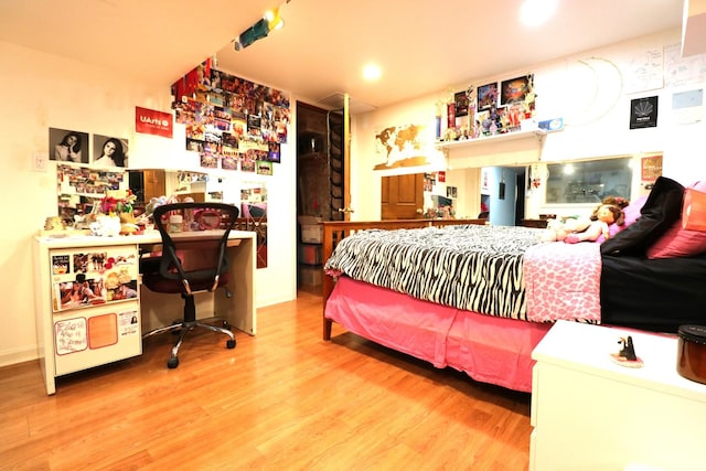 2210 Sandburg Dr, Aurora, IL 60506 - bedroom with wood finished floors and recessed lighting