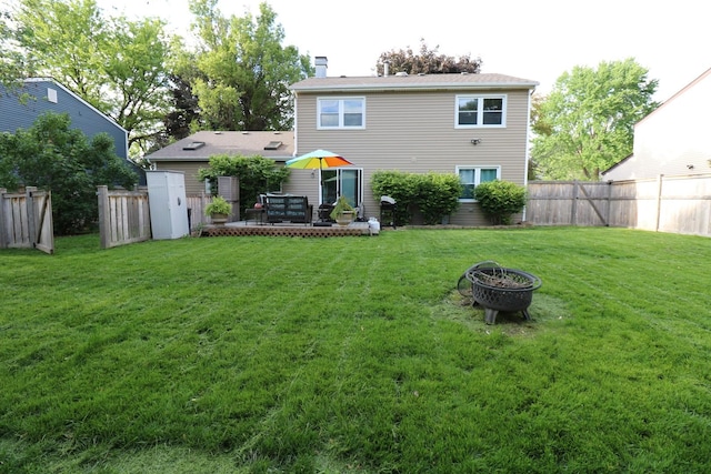 2210 Sandburg Dr, Aurora, IL 60506 - back of house featuring a chimney
