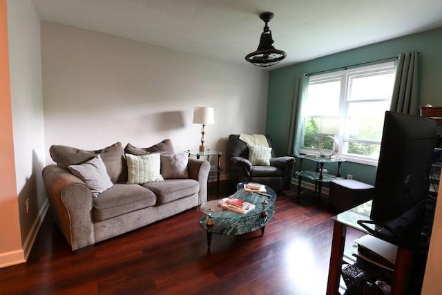 2210 Sandburg Dr, Aurora, IL 60506 - living area with dark wood-style flooring and baseboards