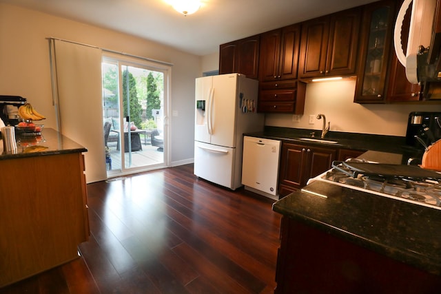 2210 Sandburg Dr, Aurora, IL 60506 - kitchen featuring white appliances, a sink, dark wood-style floors, glass insert cabinets, and baseboards