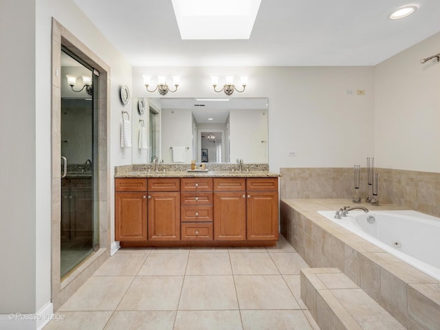 220 Kings Ct, La Grange Park, IL 60526 - full bath with a whirlpool tub, double vanity, a skylight, tile patterned flooring, and a stall shower