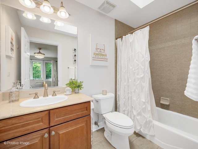 220 Kings Ct, La Grange Park, IL 60526 - full bathroom with vanity, tile patterned floors, toilet, shower / bath combo with shower curtain, and a skylight