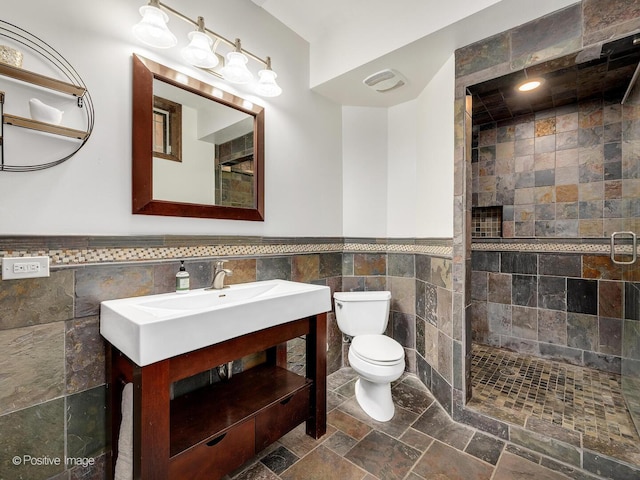 220 Kings Ct, La Grange Park, IL 60526 - bathroom with tile walls, tiled shower, toilet, vanity, and wainscoting