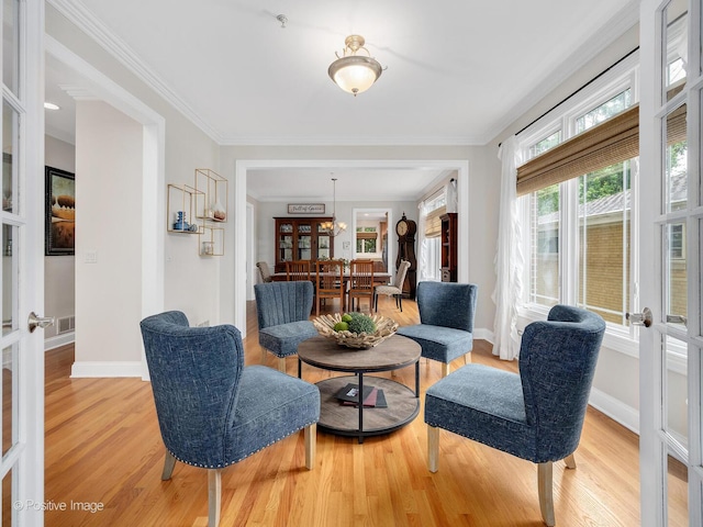 220 Kings Ct, La Grange Park, IL 60526 - sitting room featuring wood finished floors, french doors, baseboards, and crown molding