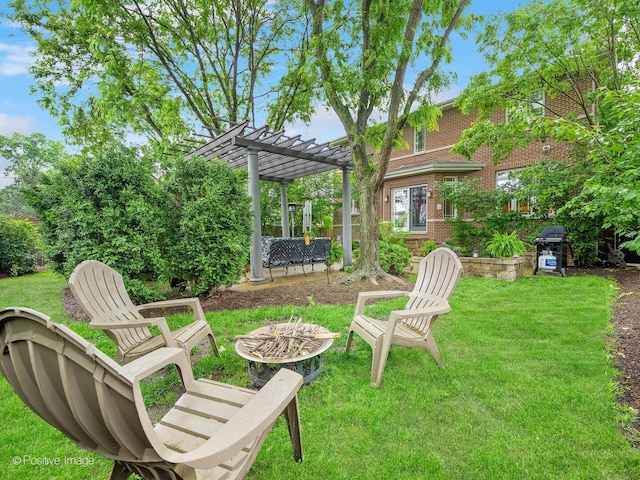 220 Kings Ct, La Grange Park, IL 60526 - view of grassy yard featuring a fire pit and a pergola