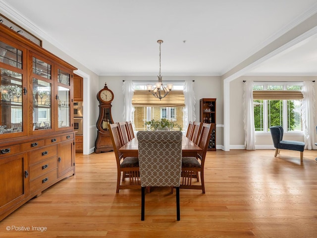 220 Kings Ct, La Grange Park, IL 60526 - dining room featuring a chandelier, light wood finished floors, baseboards, and ornamental molding