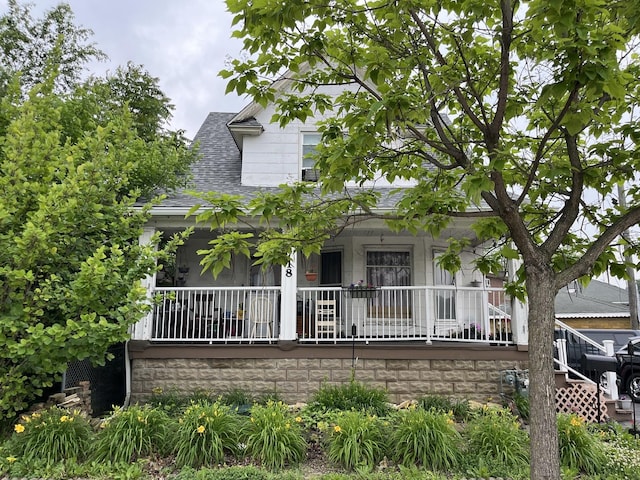 718 Plainfield Rd, Joliet, IL 60435 - view of front facade with a porch and a shingled roof