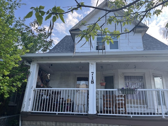 718 Plainfield Rd, Joliet, IL 60435 - view of front of home with a shingled roof and covered porch