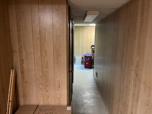 718 Plainfield Rd, Joliet, IL 60435 - hall with unfinished concrete floors and a drop ceiling